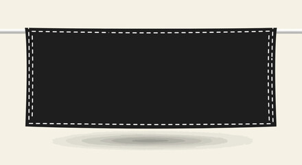 Stylish black banner with stitched border hanging on a wire for product display