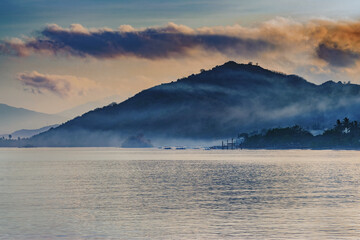 Distant Mountains And Nearby Water Body Scenic Landscape Photography