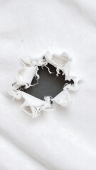 Ripped white fabric