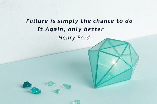 Glowing teal prism and motivational quote about failure