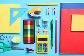 Composition with different school stationery on blue background, closeup