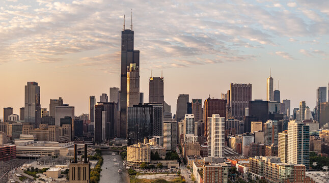  Aerial panoramic view of Downtown Chicago skyline and Willis Tower at sunrise from Ping Tom Memorial Park along the Chicago River, Illinois
