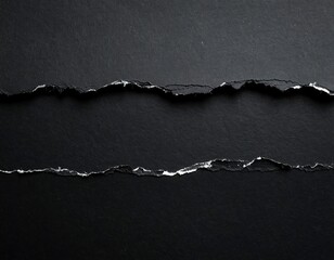 Two layers of black paper with torn edges