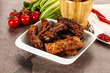 Grilled pork ribs in barbecue sauce