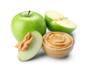 Fresh apples and glass bowl of sweet peanut butter on white background