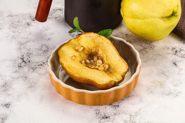 Baked quince with honey and cedar