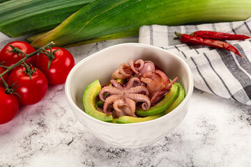 Salad with baby octopus and avocado