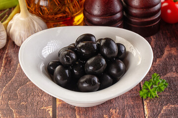 Mediterranean marinated Black olives in the bowl