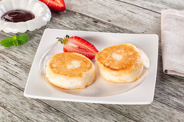 Cottage cheese pancakes - Syrniki for breakfast