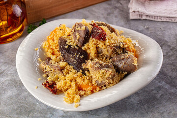 Traditional couscous with lamb and vegetables