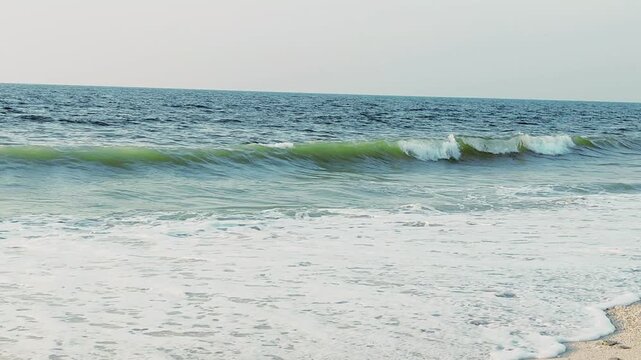 Water waves Sea Shore Beautiful Panorama white sand beach and turquoise water View.
Holiday summer beach background, Wave of sea on White sandy beach.
Enjoy Holiday on Public Beach Heavy Water Waves