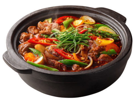 Hearty stew in dark pot, various vegetables and meat