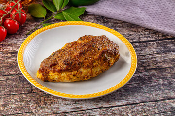 Baked chicken breast with spices and herbs
