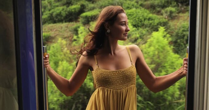 Model In Yellow Dress Leaning Out Train Door On Ella To Nuwara Eliya Route