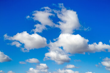 Blue sky with white clouds. Cumulus clouds in blue sky