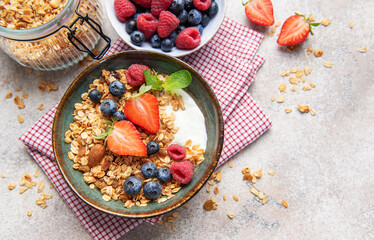 Granola bowl with fresh berries yogurt and nuts