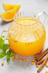 Hot sea buckthorn tea with orange mint cinnamon