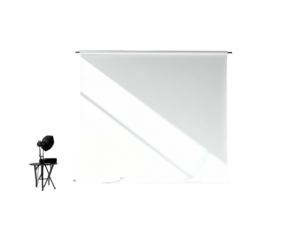 White screen and microphone stand in a dark room, angled lighting
