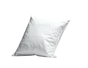 Square white pillow on black backdrop. Fluffy, soft, and tilted slightly to the right