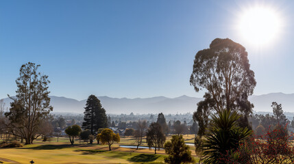 fairway. Vast green golf course under bright sunlight, capturing the tranquility of open landscapes. travel magazines, destination branding, designed for outdoor magazines and nature guides.