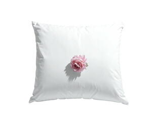 Square white pillow with a delicate pink rose in the center, casting a soft shadow