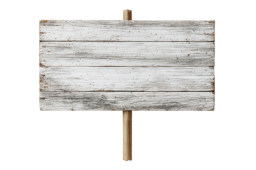 A weathered, white wooden sign with a light brown post