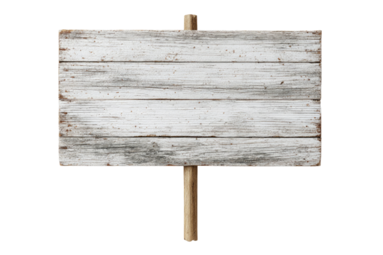 A weathered, white wooden sign with a light brown post