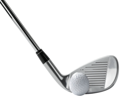 Close-up of a golf club poised to strike a golf ball on a black background