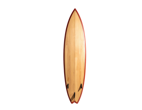 A wooden surfboard with red trim and fins against a black background