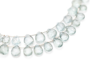 Moss Aquamarine Faceted Teardrop Gemstones on White