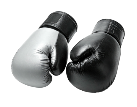 A pair of boxing gloves, one black, one silver, on a black background