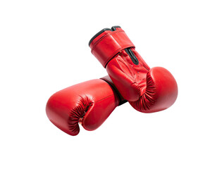 Two bright red leather boxing gloves, one over the other, against a black background