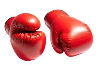 Two vibrant red boxing gloves against a stark black background, showcasing detail