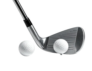 Golf club poised above a ball, another ball at the side, black background