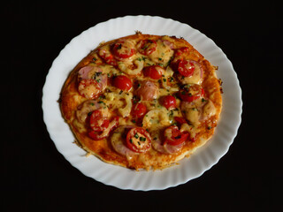 Appetizing Homemade Pizza on a White Plate