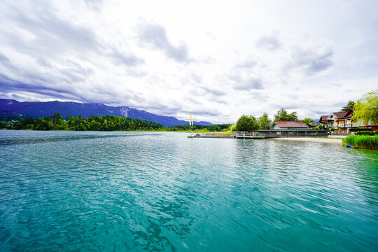 View of Lake Faak and the surrounding landscape in Carinthia. Nature by the lake in Austria.
