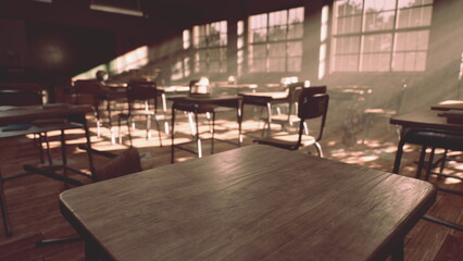 Desks and chairs fill a serene classroom, where soft sunlight streams through large windows, casting gentle shadows and evoking memories of laughter and learning.