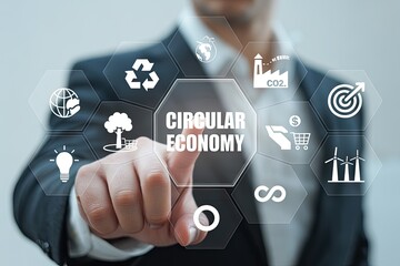Businessman points to futuristic circular economy interface with sustainability icons promoting growth