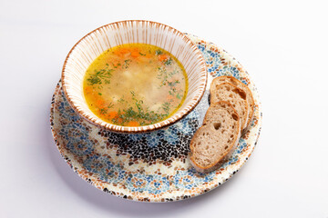 Traditional noodle soup in a bowl.