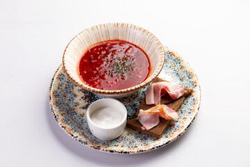 Traditional borscht soup in a bowl.