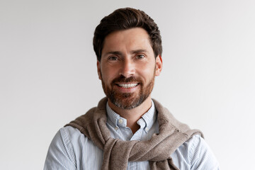 Smiling bearded Latin man wearing stylish casual clothes confident and happy looking at camera