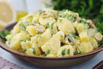 A bowl with Greek potato salads	