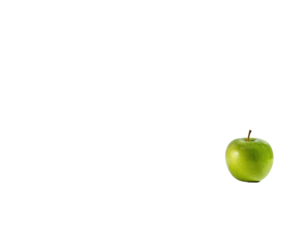 A vibrant green apple sits isolated against a stark, solid black background