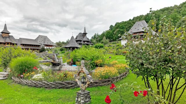 Flower garden at Barsana monastery church complex Maramures Romania