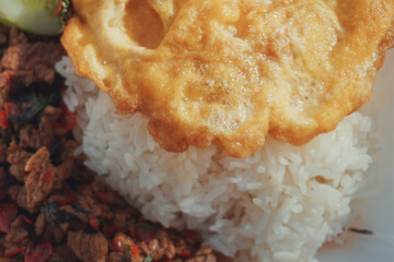 Close-up of beef basil rice with omelet