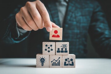 A hand preventing falling dominoes from hitting human figures, symbolizing proactive risk management, intervention, and crisis prevention for business and personal security