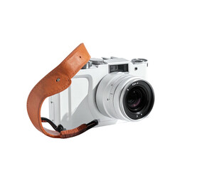 White digital camera with leather strap against black background