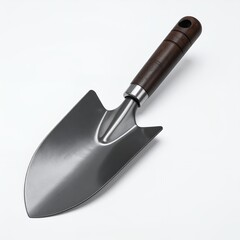 Elevated shot of a garden trowel with a wooden handle against a plain white backdrop