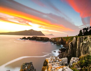 Dramatic sunset over rugged coastline