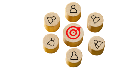 Wooden circles, target, and people icons; collaborative focus